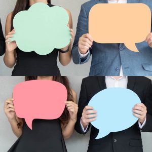 People are holding colorful Speech Bubbles.