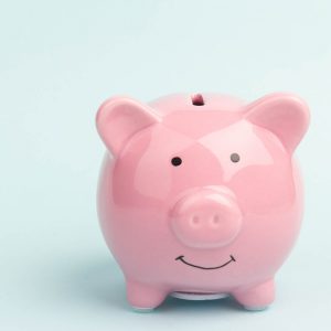 Piggy bank on blue background